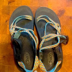 Barely worn womens Chacos. Multi-colored straps.